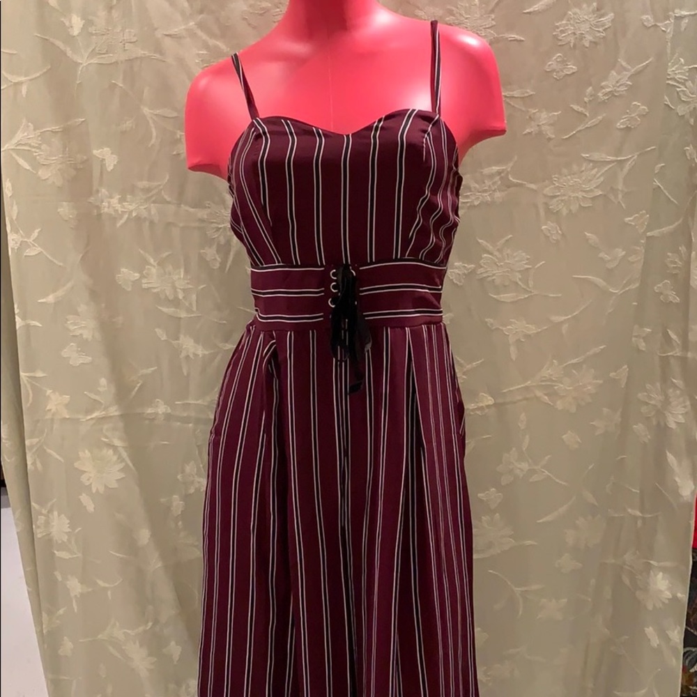 Striped maroon jumper.